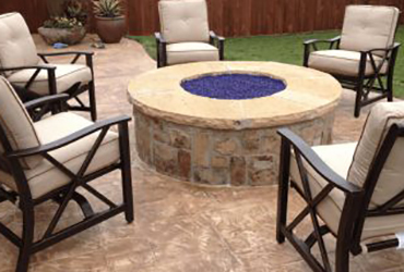 custom fire pit built by Lawn Connections