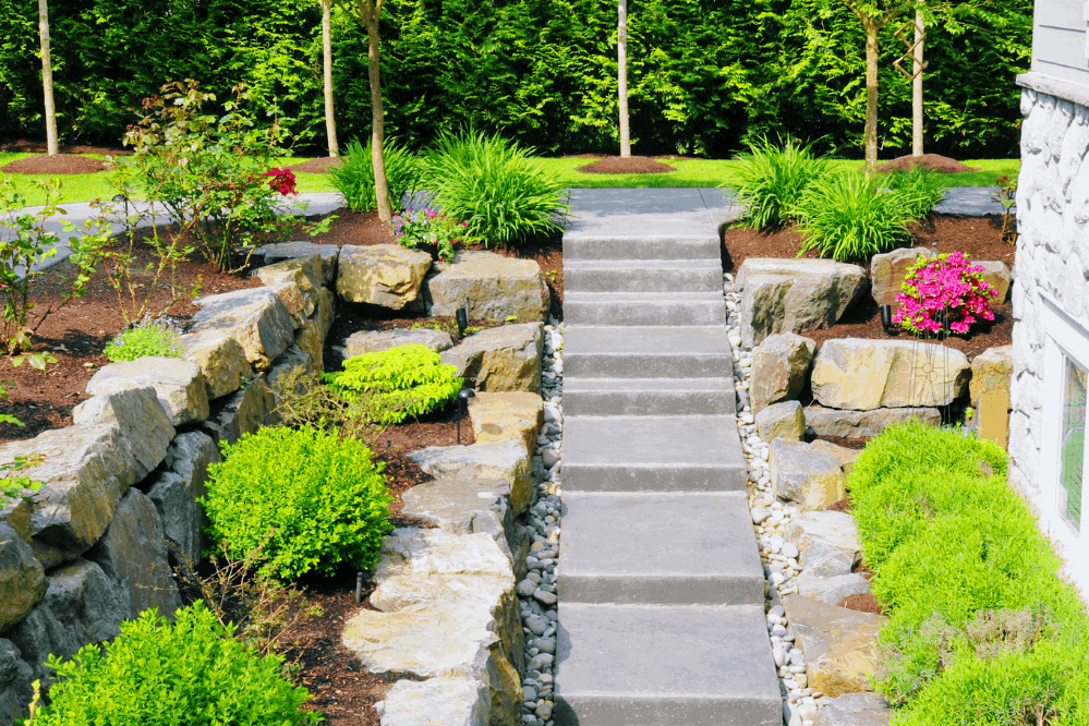 stone path hardscape landscape design with landscape installation by Lawn Connections